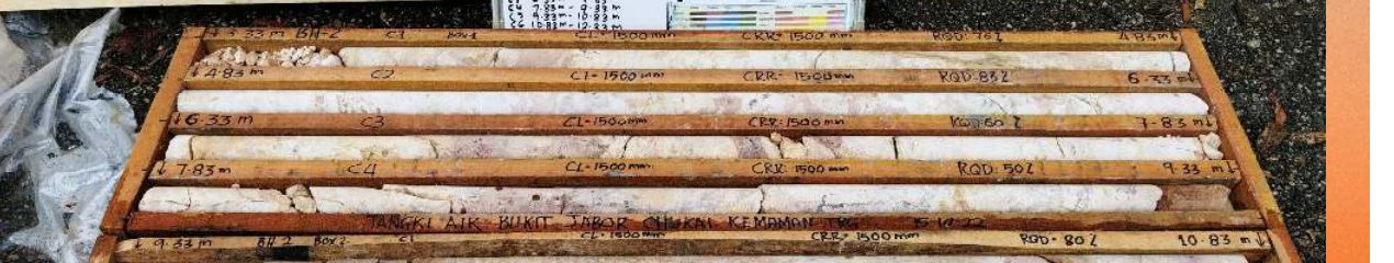 Rock core samples stored in a labelled core box